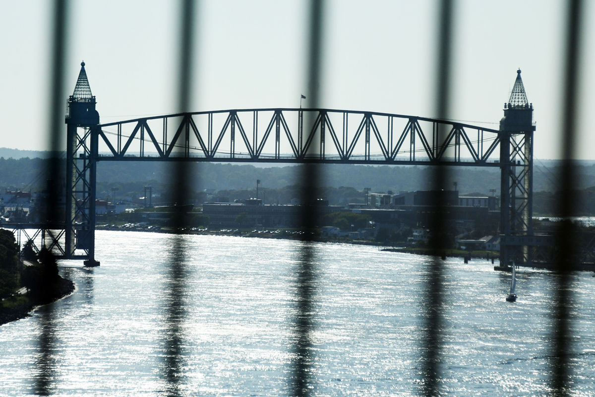 293 The Cape Cod Railroad Bridge in Bourne, MA, is a vertical lift railroad bridge. Photographed from the Bourne Bridge..jpg